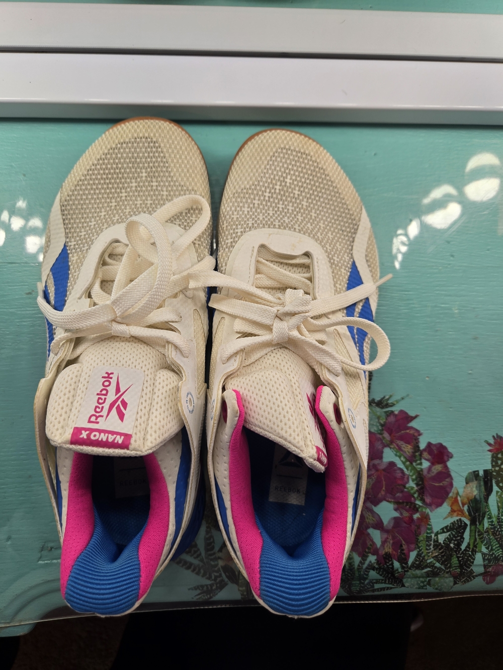 Reebok Nano Women’s Cream Athletic Shoes with Blue and Pink Accents